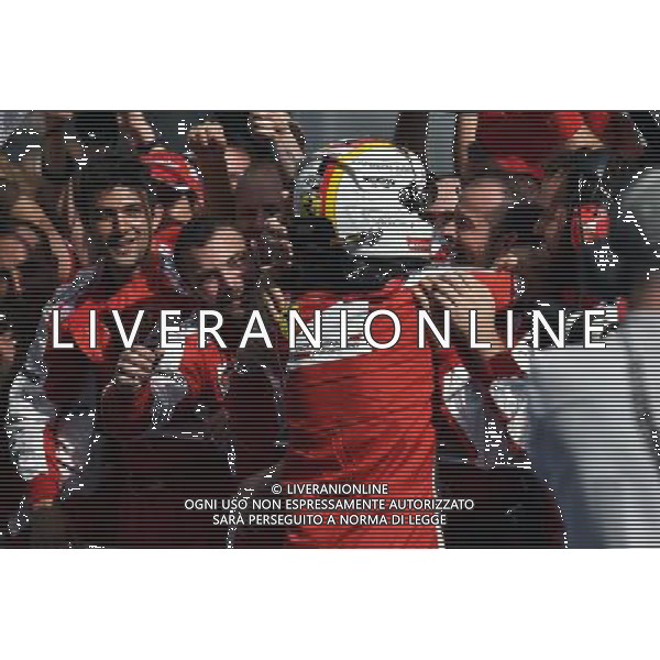 Race winner Sebastian Vettel (GER) Ferrari celebrates in parc ferme. 29.03.2015. Formula 1 World Championship, Rd 2, Malaysian Grand Prix, Sepang, Malaysia, Sunday. - www.xpbimages.com, EMail: requests@xpbimages.com - copy of publication required for printed pictures. Every used picture is fee-liable. © Copyright: Price / XPB Images ONLY ITALY-EDITORIAL USE ONLY-Agenzia Aldo Liverani s.a.s.