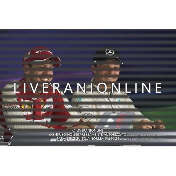 (L to R): Race winner Sebastian Vettel (GER) Ferrari and Nico Rosberg (GER) Mercedes AMG F1 in the FIA Press Conference. 29.03.2015. Formula 1 World Championship, Rd 2, Malaysian Grand Prix, Sepang, Malaysia, Sunday. - www.xpbimages.com, EMail: requests@xpbimages.com - copy of publication required for printed pictures. Every used picture is fee-liable. Â© Copyright: Price / XPB Images/Agenzia Aldo Liverani s.a.s.