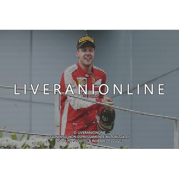 Race winner Sebastian Vettel (GER) Ferrari celebrates on the podium. 29.03.2015. Formula 1 World Championship, Rd 2, Malaysian Grand Prix, Sepang, Malaysia, Sunday. - www.xpbimages.com, EMail: requests@xpbimages.com - copy of publication required for printed pictures. Every used picture is fee-liable. Â© Copyright: Photo4 / XPB Images/Agenzia Aldo Liverani s.a.s.