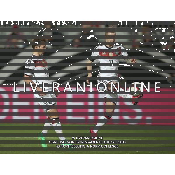 firo Fu§ball,Fussball, 25.03.2015 LŠnderspiel Nationalmannschaft: Freundschaftsspiel Deutschland - Australien 2:2 Einzelaktion Marco Reus und Mario Gštze $worldrightsEs gelten unsere AGB, einsehbar auf www.firosportphoto.de copyright by firo sportphoto: /AGENZIA ALDO LIVERANI SAS - ITALY ONLY - EDITORIAL USE ONLY - germania australia