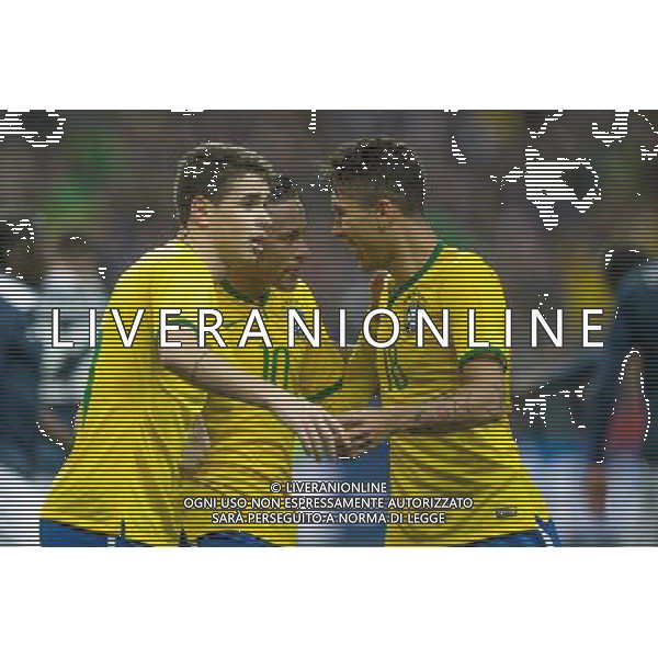Joie Bresil - Oscar / Neymar / Roberto Firmino - 26.03.2015 - France / Bresil - Match Amical Photo : Andre Ferreira / Icon Sport AG ALDO LIVERANI SAS ONLY ITALY