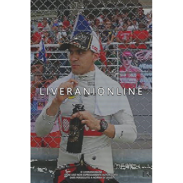 Pastor Maldonado (VEN) Lotus F1 Team on the grid. 29.03.2015. Formula 1 World Championship, Rd 2, Malaysian Grand Prix, Sepang, Malaysia, Sunday. AG ALDO LIVERANI SAS ONLY ITALY