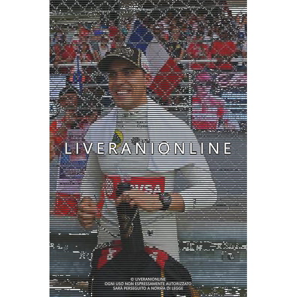 Pastor Maldonado (VEN) Lotus F1 Team on the grid. 29.03.2015. Formula 1 World Championship, Rd 2, Malaysian Grand Prix, Sepang, Malaysia, Sunday. AG ALDO LIVERANI SAS ONLY ITALY