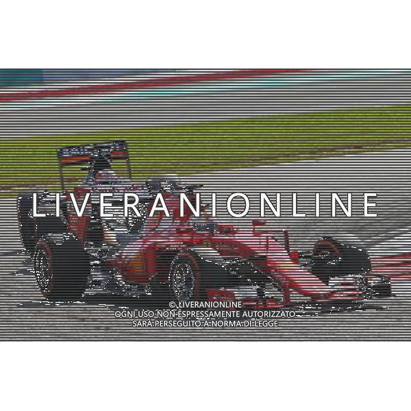 Sebastian Vettel (GER) Ferrari SF15-T. 29.03.2015. Formula 1 World Championship, Rd 2, Malaysian Grand Prix, Sepang, Malaysia, Sunday. AG ALDO LIVERANI SAS ONLY ITALY