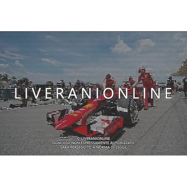 Kimi Raikkonen (FIN) Ferrari SF15-T on the grid. 29.03.2015. Formula 1 World Championship, Rd 2, Malaysian Grand Prix, Sepang, Malaysia, Sunday. AG ALDO LIVERANI SAS ONLY ITALY