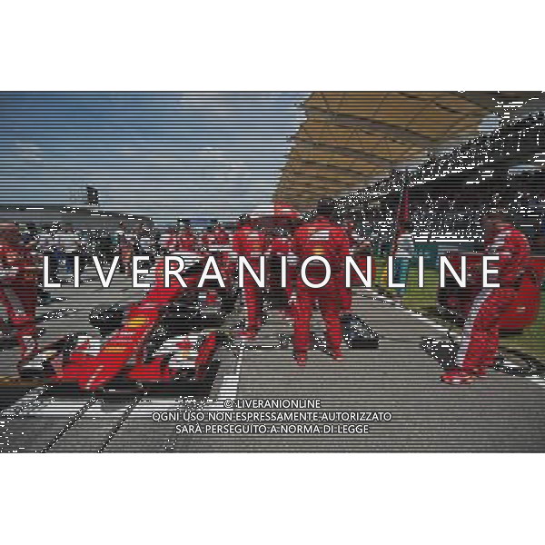 Sebastian Vettel (GER) Ferrari SF15-T on the grid. 29.03.2015. Formula 1 World Championship, Rd 2, Malaysian Grand Prix, Sepang, Malaysia, Sunday. AG ALDO LIVERANI SAS ONLY ITALY