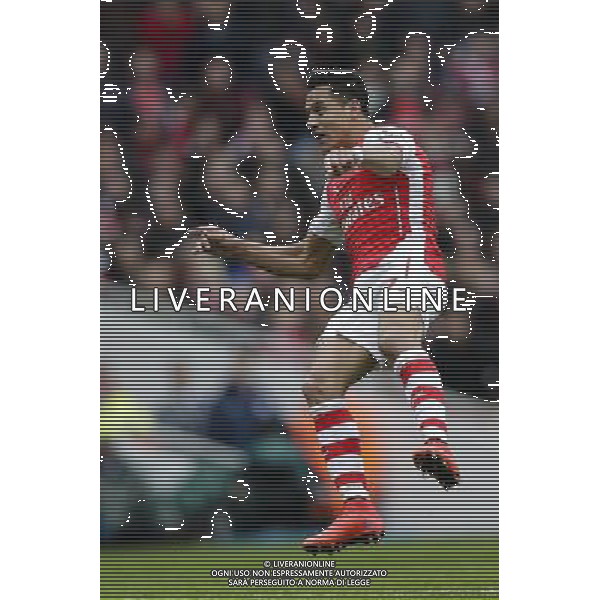 Arsenal\'s Alexis Sanchez scores his sides third goal Photographer Craig Mercer/CameraSport Football - Barclays Premiership - Arsenal v Liverpool - Saturday 4th April 2015 - The Emirates Stadium - London © CameraSport - 43 Linden Ave. Countesthorpe. Leicester. England. LE8 5PG - Tel: +44 (0) 116 277 4147 - admin@camerasport.com - www.camerasport.com AG ALDO LIVERANI SAS ONLY ITALY