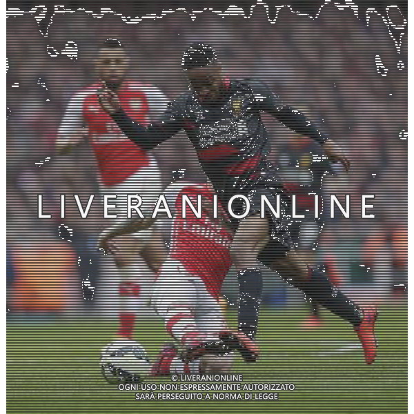 Arsenal\'s Hector Bellerin brings down Liverpool\'s Raheem Sterling to concede a penalty Photographer Craig Mercer/CameraSport Football - Barclays Premiership - Arsenal v Liverpool - Saturday 4th April 2015 - The Emirates Stadium - London © CameraSport - 43 Linden Ave. Countesthorpe. Leicester. England. LE8 5PG - Tel: +44 (0) 116 277 4147 - admin@camerasport.com - www.camerasport.com AG ALDO LIVERANI SAS ONLY ITALY