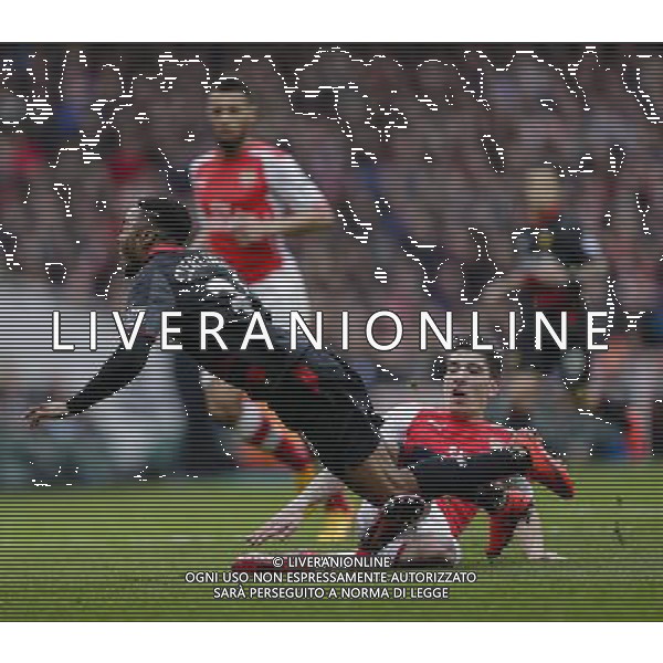 Arsenal\'s Hector Bellerin brings down Liverpool\'s Raheem Sterling to concede a penalty Photographer Craig Mercer/CameraSport Football - Barclays Premiership - Arsenal v Liverpool - Saturday 4th April 2015 - The Emirates Stadium - London © CameraSport - 43 Linden Ave. Countesthorpe. Leicester. England. LE8 5PG - Tel: +44 (0) 116 277 4147 - admin@camerasport.com - www.camerasport.com AG ALDO LIVERANI SAS ONLY ITALY