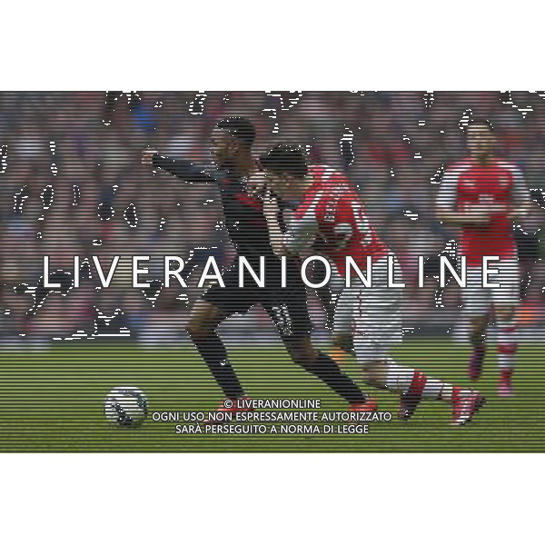 Arsenal\'s Hector Bellerin battles for possession with Liverpool\'s Raheem Sterling Photographer Craig Mercer/CameraSport Football - Barclays Premiership - Arsenal v Liverpool - Saturday 4th April 2015 - The Emirates Stadium - London © CameraSport - 43 Linden Ave. Countesthorpe. Leicester. England. LE8 5PG - Tel: +44 (0) 116 277 4147 - admin@camerasport.com - www.camerasport.com AG ALDO LIVERANI SAS ONLY ITALY
