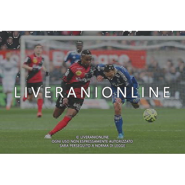 Steed MALBRANQUE / Christophe MANDANNE - 04.04.2015 - Guingamp / Lyon - 31eme journee de Ligue 1 Photo : Vincent Michel / Icon Sport /Agenzia Aldo Liverani sas - ITALY ONLY - EDITORIAL USE ONLY