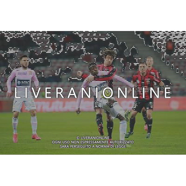 Clarck NSIKULU / Gregoire PUEL - 04.04.2015 - Nice / Evian Thonon - 31eme journee de Ligue 1 Photo : Serge Haouzi / Icon Sport AG ALDO LIVERANI SAS ONLY ITALY