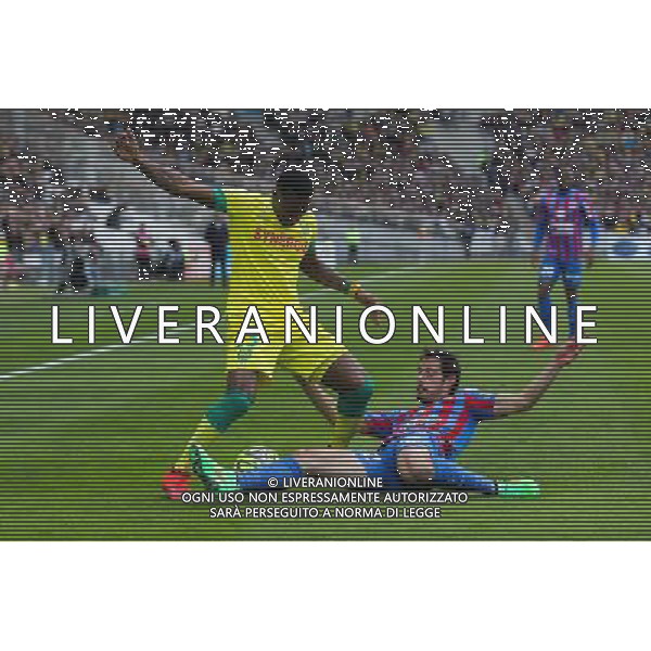 Serge GAKPE / Nicolas SEUBE - 05.04.2015 - Nantes / Caen - 31eme journee de Ligue 1 Photo : Vincent Michel / Icon Sport AG ALDO LIVERANI SAS ONLY ITALY