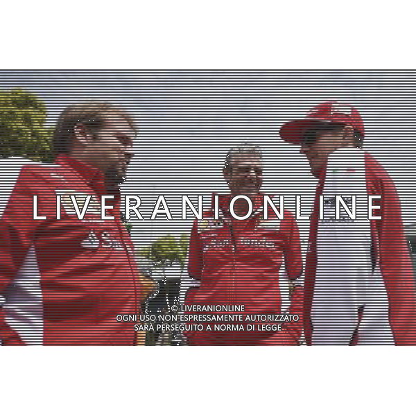 (L to R): Gino Rosato (CDN) Ferrari with Maurizio Arrivabene (ITA) Ferrari Team Principal and Kimi Raikkonen (FIN) Ferrari. 09.04.2015. Formula 1 World Championship, Rd 3, Chinese Grand Prix, Shanghai, China, Preparation Day. /Agenzia Aldo Liverani sas - ITALY ONLY - EDITORIAL USE ONLY - GP F1 CINA