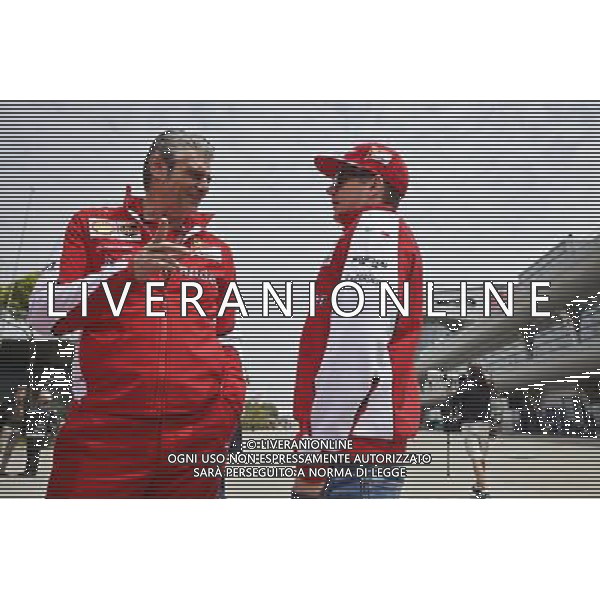 (L to R): Maurizio Arrivabene (ITA) Ferrari Team Principal with Kimi Raikkonen (FIN) Ferrari. 09.04.2015. Formula 1 World Championship, Rd 3, Chinese Grand Prix, Shanghai, China, Preparation Day. /Agenzia Aldo Liverani sas - ITALY ONLY - EDITORIAL USE ONLY - GP F1 CINA