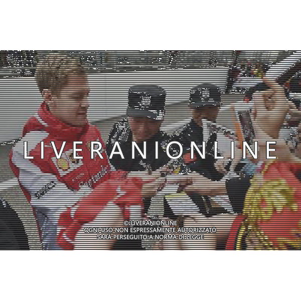 Sebastian Vettel (GER) Ferrari signs autographs for the fans. 09.04.2015. Formula 1 World Championship, Rd 3, Chinese Grand Prix, Shanghai, China, Preparation Day. /Agenzia Aldo Liverani sas - ITALY ONLY - EDITORIAL USE ONLY - GP F1 CINA