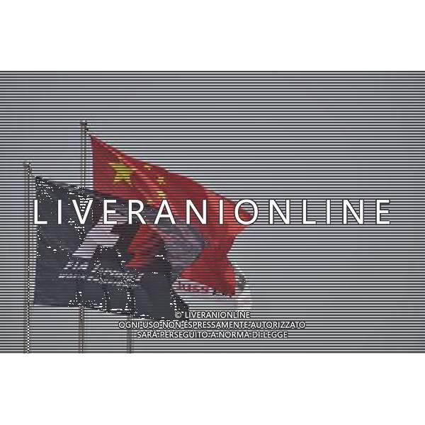 Chinese and F1 flags. 10.04.2015. Formula 1 World Championship, Rd 3, Chinese Grand Prix, Shanghai, China, Practice Day. AG ALDO LIVERANI SAS ONLY ITALY