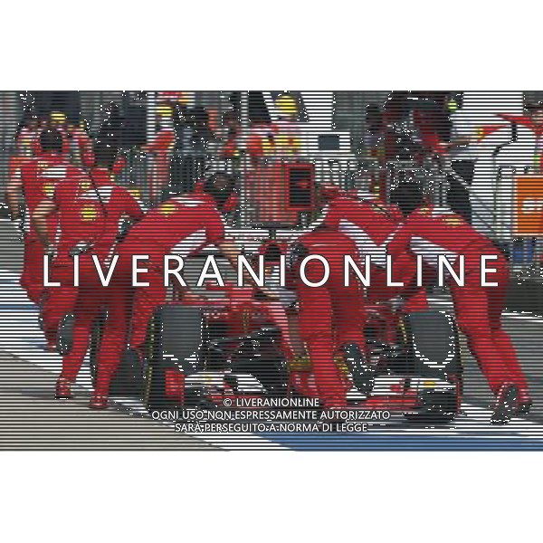 Sebastian Vettel (GER) Ferrari SF15-T is pushed back in the pits. 10.04.2015. Formula 1 World Championship, Rd 3, Chinese Grand Prix, Shanghai, China, Practice Day. AG ALDO LIVERANI SAS ONLY ITALY