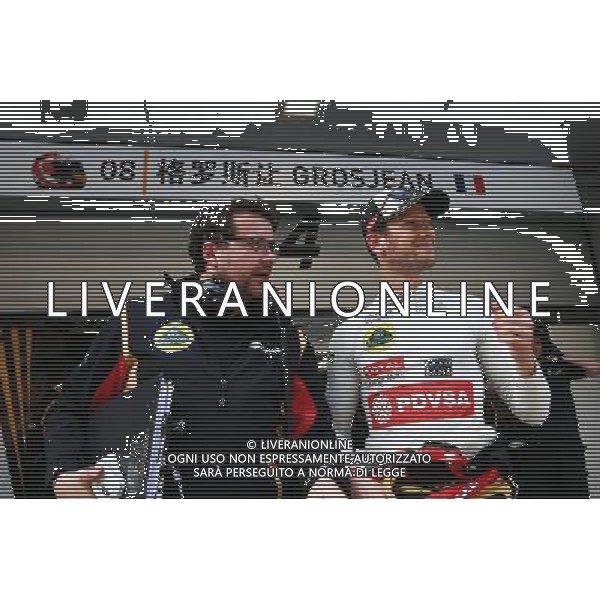 (L to R): Julien Simon-Chautemps (FRA) Lotus F1 Team Race Engineer with Romain Grosjean (FRA) Lotus F1 Team. 10.04.2015. Formula 1 World Championship, Rd 3, Chinese Grand Prix, Shanghai, China, Practice Day. AG ALDO LIVERANI SAS ONLY ITALY