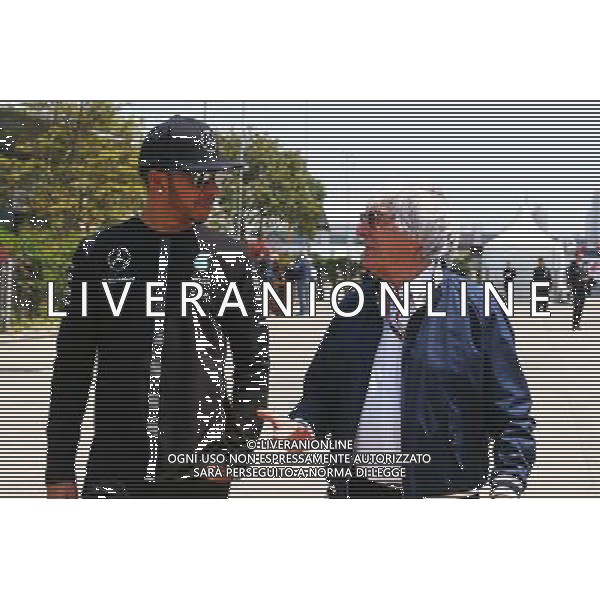 (L to R): Lewis Hamilton (GBR) Mercedes AMG F1 with Bernie Ecclestone (GBR). 11.04.2015. Formula 1 World Championship, Rd 3, Chinese Grand Prix, Shanghai, China, Qualifying Day. AG ALDO LIVERANI SAS ONLY ITALY