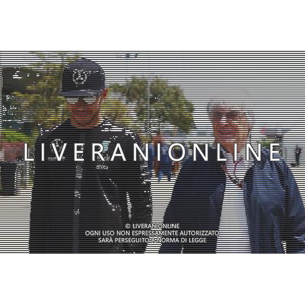 (L to R): Lewis Hamilton (GBR) Mercedes AMG F1 with Bernie Ecclestone (GBR). 11.04.2015. Formula 1 World Championship, Rd 3, Chinese Grand Prix, Shanghai, China, Qualifying Day. AG ALDO LIVERANI SAS ONLY ITALY