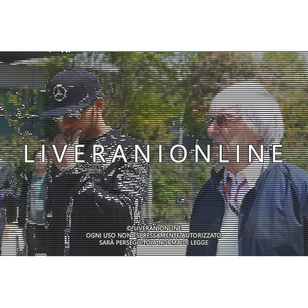 (L to R): Lewis Hamilton (GBR) Mercedes AMG F1 with Bernie Ecclestone (GBR). 11.04.2015. Formula 1 World Championship, Rd 3, Chinese Grand Prix, Shanghai, China, Qualifying Day. AG ALDO LIVERANI SAS ONLY ITALY
