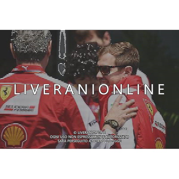 Sebastian Vettel (GER) Ferrari with Maurizio Arrivabene (ITA) Ferrari Team Principal. 11.04.2015. Formula 1 World Championship, Rd 3, Chinese Grand Prix, Shanghai, China, Qualifying Day. AG ALDO LIVERANI SAS ONLY ITALY