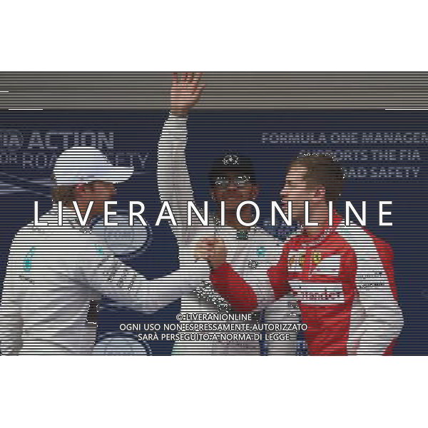 Pole for Lewis Hamilton (GBR) Mercedes AMG F1 2nd for Nico Rosberg (GER) Mercedes AMG F1 and 3rd for Sebastian Vettel (GER) Ferrari. 11.04.2015. Formula 1 World Championship, Rd 3, Chinese Grand Prix, Shanghai, China, Qualifying Day. AG ALDO LIVERANI SAS ONLY ITALY
