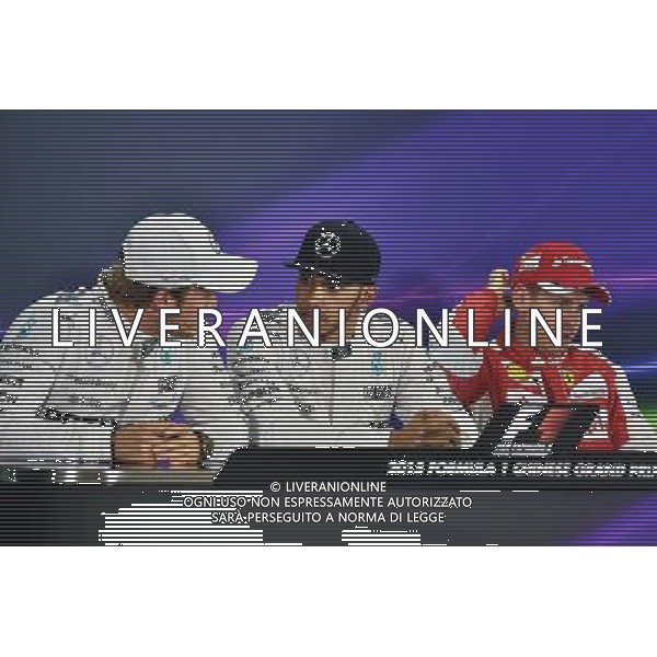 Qualifying top three in the FIA Press Conference (L to R): Nico Rosberg (GER) Mercedes AMG F1, second; Lewis Hamilton (GBR) Mercedes AMG F1, pole position; Sebastian Vettel (GER) Ferrari, third. 11.04.2015. Formula 1 World Championship, Rd 3, Chinese Grand Prix, Shanghai, China, Qualifying Day. AG ALDO LIVERANI SAS ONLY ITALY