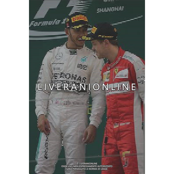 Lewis Hamilton (GBR), Mercedes AMG F1 Team and Sebastian Vettel (GER), Scuderia Ferrari 12.04.2015. Formula 1 World Championship, Rd 3, Chinese Grand Prix, Shanghai, China, Race Day. AG ALDO LIVERANI SAS ONLY ITALY