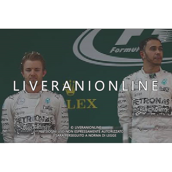 2nd place Nico Rosberg (GER) Mercedes AMG F1 with 1st place Lewis Hamilton (GBR) Mercedes AMG F1. 12.04.2015. Formula 1 World Championship, Rd 3, Chinese Grand Prix, Shanghai, China, Race Day. AG ALDO LIVERANI SAS ONLY ITALY