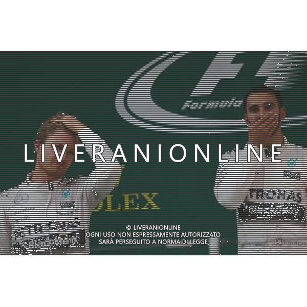 Nico Rosberg (GER) Mercedes AMG F1 W06 and 1st place Lewis Hamilton (GBR) Mercedes AMG F1. 12.04.2015. Formula 1 World Championship, Rd 3, Chinese Grand Prix, Shanghai, China, Race Day. AG ALDO LIVERANI SAS ONLY ITALY