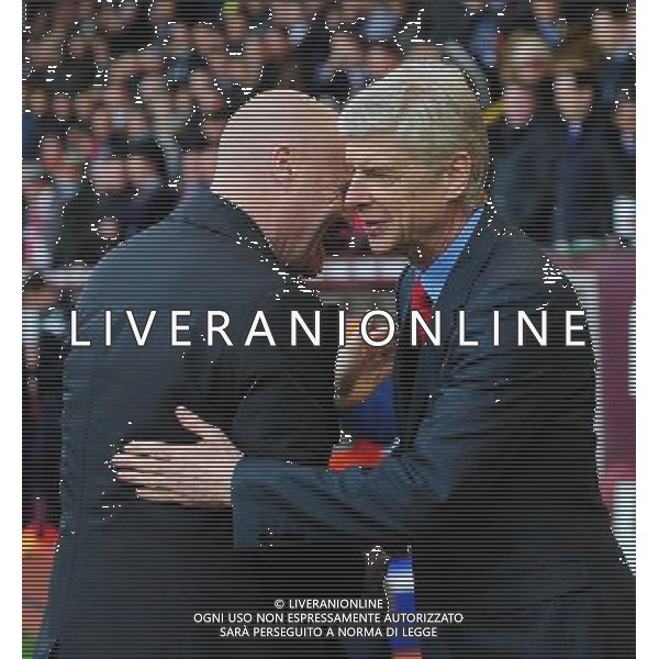 Burnley manager Sean Dyche, left, and Arsenal manager Arsene Wenger before kick off Photographer Chris Vaughan/CameraSport Football - Barclays Premiership - Burnley v Arsenal - Saturday 11th April 2015 - Turf Moor - Burnley Â¬Â© CameraSport - 43 Linden Ave. Countesthorpe. Leicester. England. LE8 5PG - Tel: +44 (0) 116 277 4147 - admin@camerasport.com - www.camerasport.com AG ALDO LIVERANI SAS ONLY ITALY