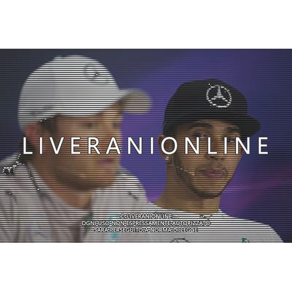 (L to R): Nico Rosberg (GER) Mercedes AMG F1 and team mate Lewis Hamilton (GBR) Mercedes AMG F1 in the FIA Press Conference. 12.04.2015. Formula 1 World Championship, Rd 3, Chinese Grand Prix, Shanghai, China, Race Day. AG ALDO LIVERANI SAS ONLY ITALY
