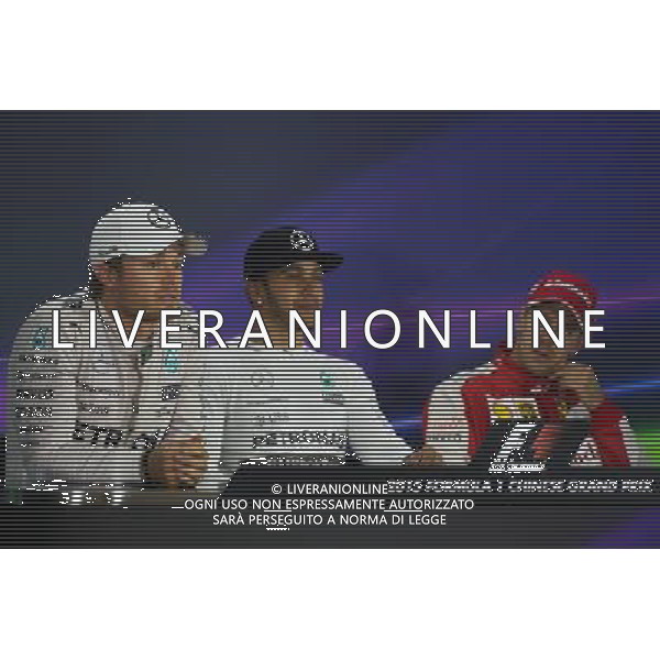 The post race FIA Press Conference (L to R): Nico Rosberg (GER) Mercedes AMG F1, second; Lewis Hamilton (GBR) Mercedes AMG F1, race winner; Sebastian Vettel (GER) Ferrari, third. 12.04.2015. Formula 1 World Championship, Rd 3, Chinese Grand Prix, Shanghai, China, Race Day. AG ALDO LIVERANI SAS ONLY ITALY
