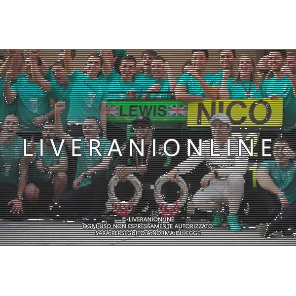 Race winner Lewis Hamilton (GBR) Mercedes AMG F1 and second placed Nico Rosberg (GER) Mercedes AMG F1 celebrate with the team. 12.04.2015. Formula 1 World Championship, Rd 3, Chinese Grand Prix, Shanghai, China, Race Day. AG ALDO LIVERANI SAS ONLY ITALY