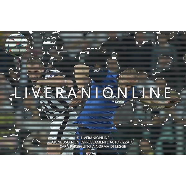 UEFA Champions League 2014/2015 Quarti di Finale Andata Torino - 14.04.2015 Juventus-Monaco Nella Foto:chiellni giorgio e berbatov /Ph.Vitez-Ag. Aldo Liverani
