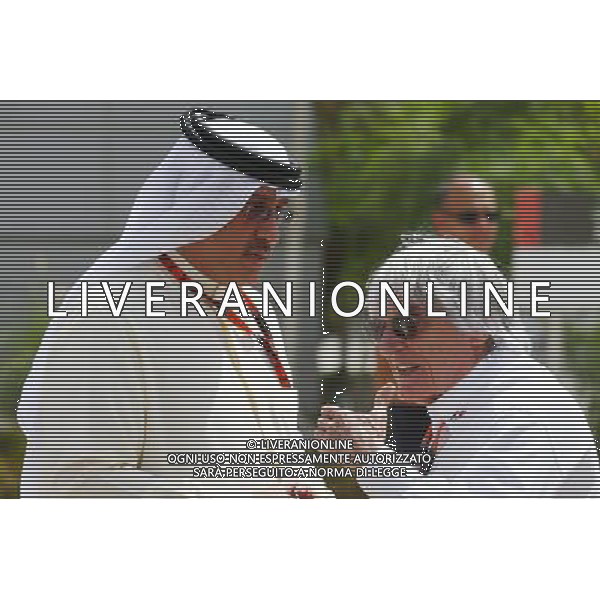 (L to R): Sheikh Mohammed bin Essa Al Khalifa (BRN) CEO of the Bahrain Economic Development Board and McLaren Shareholder with Bernie Ecclestone (GBR). 17.04.2015. Formula 1 World Championship, Rd 4, Bahrain Grand Prix, Sakhir, Bahrain, Practice Day /Agenzia Aldo Liverani Sas - ITALY ONLY - EDITORIAL USE ONLY - PROVE LIBERE
