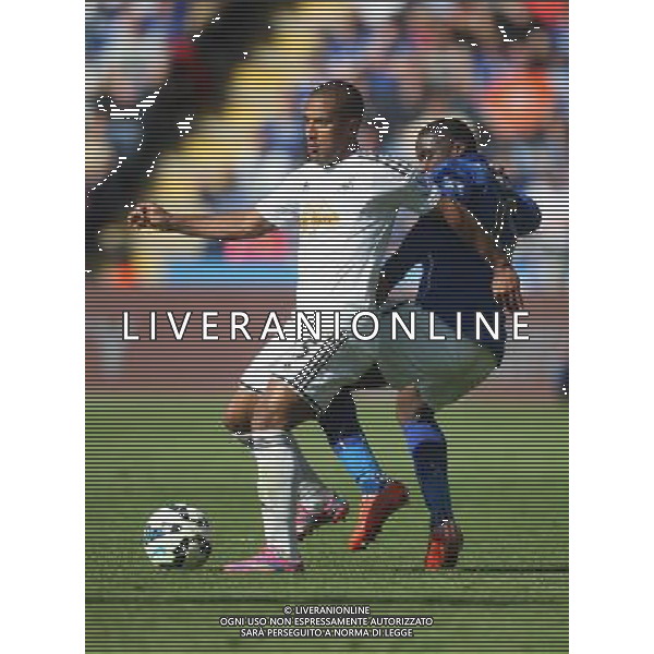 Swansea City\'s Wayne Routledge (L) and Leicester City\'s Jeffrey Schlupp in action during todays match Photographer Jack Phillips/CameraSport Football - Barclays Premiership - Leicester City v Swansea City - Saturday 18th April 2015 - King Power Stadium - Leicester © CameraSport - 43 Linden Ave. Countesthorpe. Leicester. England. LE8 5PG - Tel: +44 (0) 116 277 4147 - admin@camerasport.com - www.camerasport.com AG ALDO LIVERANI SAS ONLY ITALY
