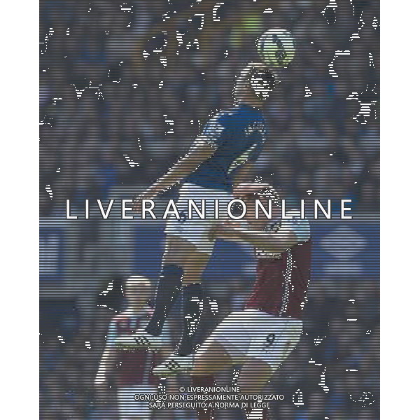 Everton\'s Phil Jagielka out jumps Burnley\'s Sam Vokes Photographer Stephen White/CameraSport Football - Barclays Premiership - Everton v Burnley - Saturday 18th April 2015 - Goodison Park - Everton © CameraSport - 43 Linden Ave. Countesthorpe. Leicester. England. LE8 5PG - Tel: +44 (0) 116 277 4147 - admin@camerasport.com - www.camerasport.com AG ALDO LIVERANI SAS ONLY ITALY
