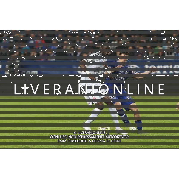 Prince ONIANGUE / Yannick CAHUZAC - 18.04.2015 - Bastia / Reims - 33eme journee de Ligue 1 Photo : Michel Maestracci / Icon Sport /Agenzia Aldo Liverani sas - ITALY ONLY - EDITORIAL USE ONLY