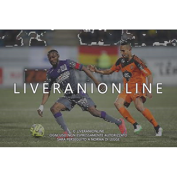 Jean Daniel AKPA AKPRO / Walid MESLOUB - 18.04.2015 - Lorient / Toulouse - 33eme journee de Ligue 1 Photo : Vincent Michel / Icon Sport AG ALDO LIVERANI SAS ONLY ITALY