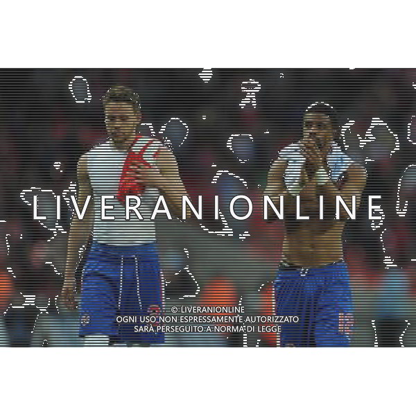 Reading\'s Chris Gunter and Reading\'s Garath McCleary look dejected at the end of the game Photographer Ian Cook/CameraSport Football - The FA Cup Semi-Final - Reading v Arsenal - Saturday 18th April 2015 - Wembley - London © CameraSport - 43 Linden Ave. Countesthorpe. Leicester. England. LE8 5PG - Tel: +44 (0) 116 277 4147 - admin@camerasport.com - www.camerasport.com AG ALDO LIVERANI SAS ONLY ITALY
