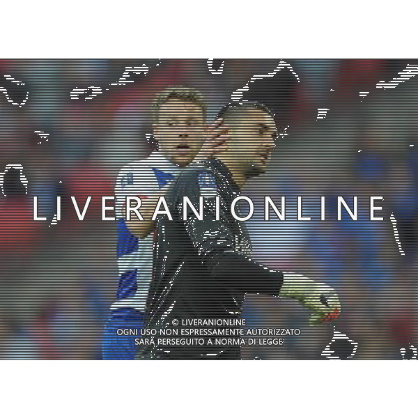 Reading\'s Chris Gunter comforts his team mate Adam Federici after a mistake led to Arsenal\'s second goal Photographer Ian Cook/CameraSport Football - The FA Cup Semi-Final - Reading v Arsenal - Saturday 18th April 2015 - Wembley - London © CameraSport - 43 Linden Ave. Countesthorpe. Leicester. England. LE8 5PG - Tel: +44 (0) 116 277 4147 - admin@camerasport.com - www.camerasport.com AG ALDO LIVERANI SAS ONLY ITALY