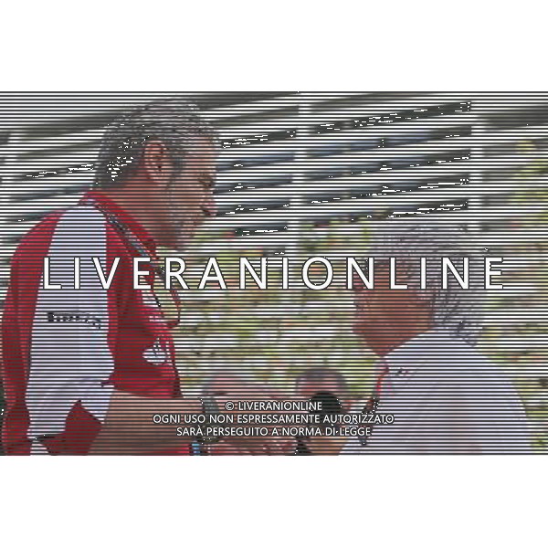 (L to R): Maurizio Arrivabene (ITA) Ferrari Team Principal with Bernie Ecclestone (GBR). 19.04.2015. Formula 1 World Championship, Rd 4, Bahrain Grand Prix, Sakhir, Bahrain, Race Day. AG ALDO LIVERANI SAS ONLY ITALY