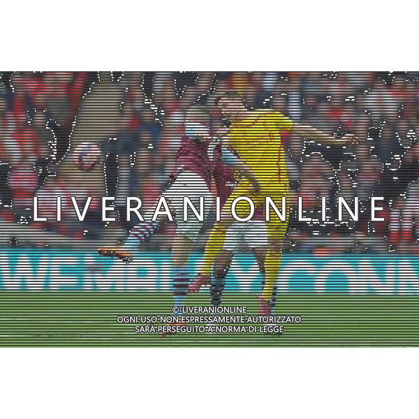 LiverpoolÕs Joe Allen and Aston Villa\'s Tom Cleverley challenge for the header Photographer Ian Cook/CameraSport Football - The FA Cup Semi-Final - Aston Villa v Liverpool - Sunday 19th April 2015 - Wembley - London © CameraSport - 43 Linden Ave. Countesthorpe. Leicester. England. LE8 5PG - Tel: +44 (0) 116 277 4147 - admin@camerasport.com - www.camerasport.com AG ALDO LIVERANI SAS ONLY ITALY