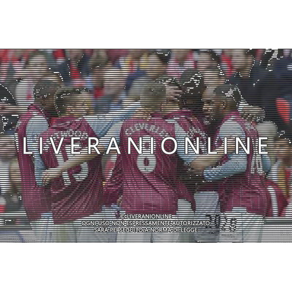 Aston Villa\'s Christian Benteke (left) celebrates with teammates after scoring his sides equalising goal to make the score 1-1 Photographer Craig Mercer/CameraSport Football - The FA Cup Semi-Final - Aston Villa v Liverpool - Sunday 19th April 2015 - Wembley - London © CameraSport - 43 Linden Ave. Countesthorpe. Leicester. England. LE8 5PG - Tel: +44 (0) 116 277 4147 - admin@camerasport.com - www.camerasport.com AG ALDO LIVERANI SAS ONLY ITALY