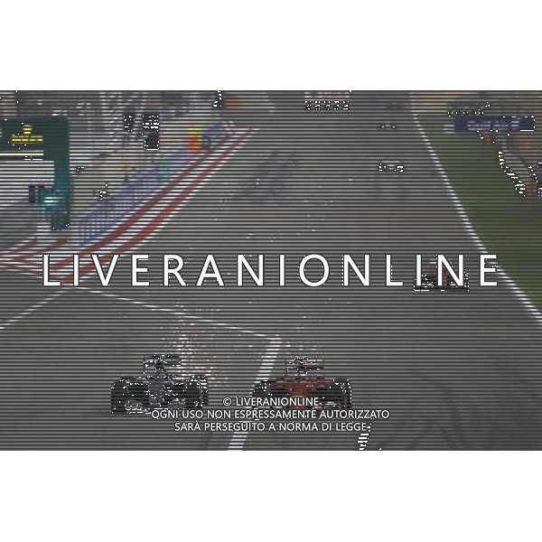 Nico Rosberg (GER) Mercedes AMG F1 W06 and Sebastian Vettel (GER) Ferrari SF15-T battle for position. 19.04.2015. Formula 1 World Championship, Rd 4, Bahrain Grand Prix, Sakhir, Bahrain, Race Day. /Agenzia Aldo Liverani Sas - ITALY ONLY - EDITORIAL USE ONLY