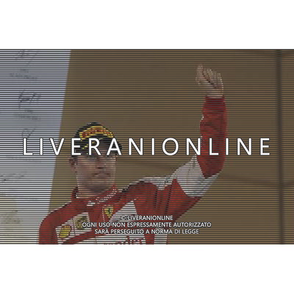 Kimi Raikkonen (FIN) Ferrari celebrates his second position on the podium. 19.04.2015. Formula 1 World Championship, Rd 4, Bahrain Grand Prix, Sakhir, Bahrain, Race Day. /Agenzia Aldo Liverani sas - ITALY ONLY - EDITORIAL USE ONLY - GARA