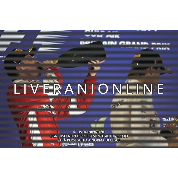 Kimi Raikkonen (FIN) Ferrari celebrates his second position on the podium. 19.04.2015. Formula 1 World Championship, Rd 4, Bahrain Grand Prix, Sakhir, Bahrain, Race Day. /Agenzia Aldo Liverani sas - ITALY ONLY - EDITORIAL USE ONLY - GARA